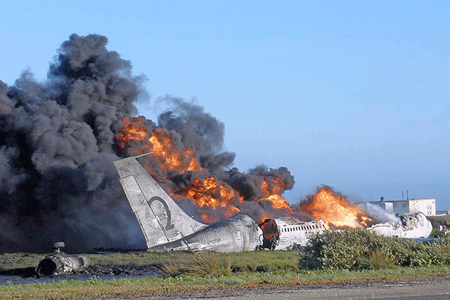 Patriot Environmental Services disaster recovery team prepares to assist with a burning airplane